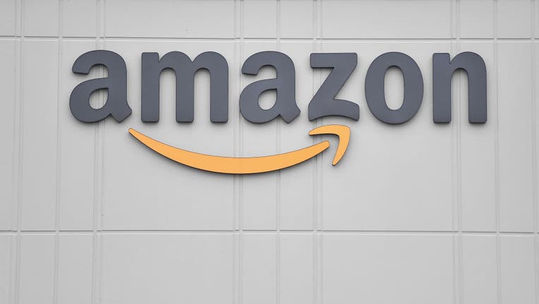 The logo of online retail giant Amazon is seen on March 30, 2020 at a distribution center.