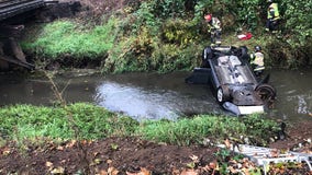 Police: Car reported stolen found upside-down in Renton creek