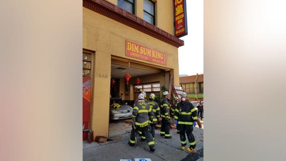 Four hurt after car crashes into restaurant in Seattle's International District