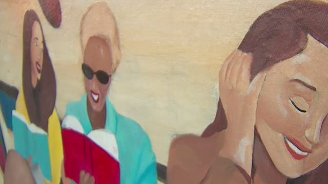 Man arrested for pulling gun on artist painting community mural