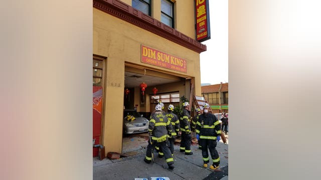 Four hurt after car crashes into restaurant in Seattle's International District