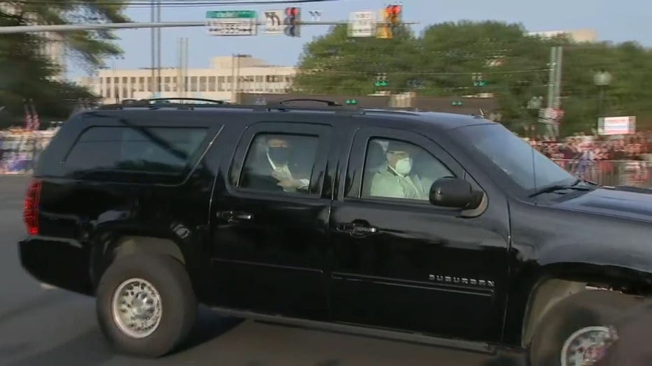 A screengrab from video shows President Donald Trump driving past supporters gathered outside Walter Reed National Military Medical Center in Bethesda, Md., on Oct. 4, 2020. (Photo credit: FOX Television Stations)