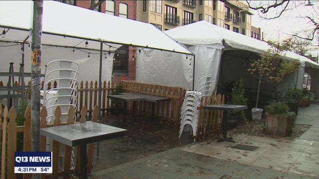 Seattle businesses tightly secure outdoor seating tents ahead of windy weather