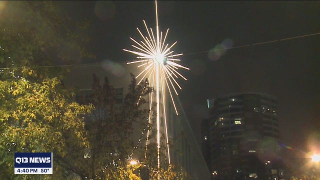 Iconic star in downtown Seattle gets new technology to give virtual holiday cheer and support a cause