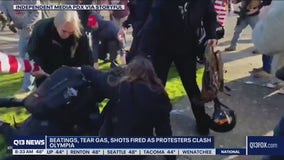 Rally goers and counter-protesters clash in Olympia, one person arrested