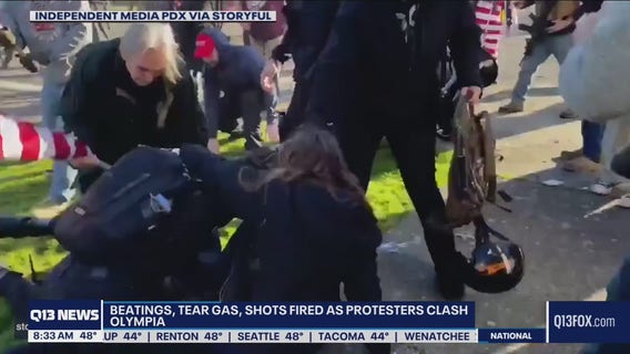 Rally goers and counter-protesters clash in Olympia, one person arrested