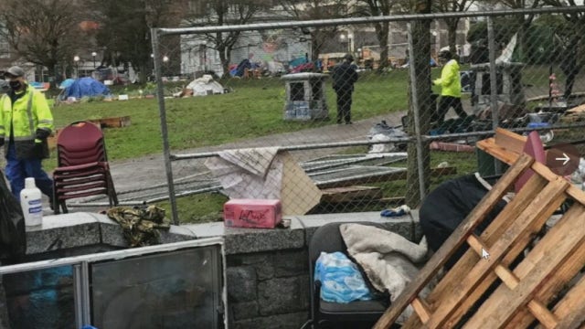 At least 24 arrests as Seattle police clear homeless camp in Cal Anderson Park