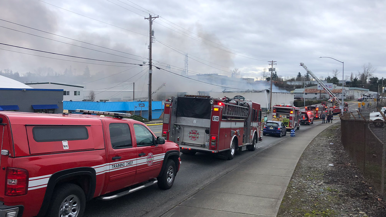 Crews battle two-alarm fire at commercial warehouse in Tacoma | FOX 13 ...