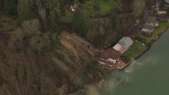 Neighbors wait while landslide continues to move on Kitsap Peninsula