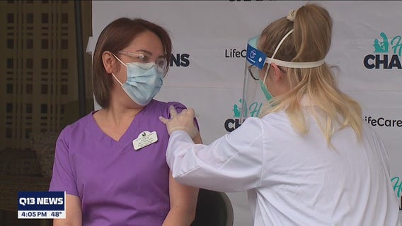Emotional moment as residents, staffers at Life Care Center of Kirkland get second dose of vaccine