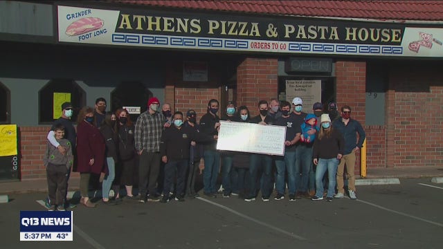 Local firefighters present $1000 check to help beloved restaurant that burned in a fire