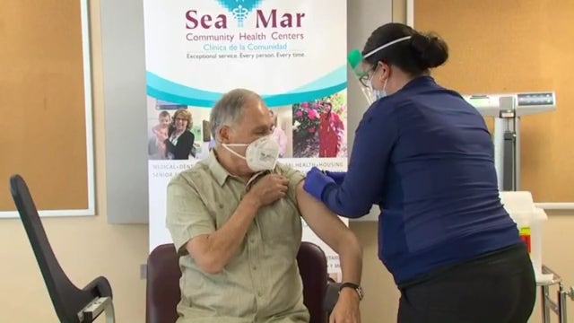 Washington Gov. Jay Inslee receives COVID-19 vaccine