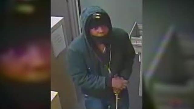 Help ID bank burglar who smashed-out front glass door, only got away with rolled coins