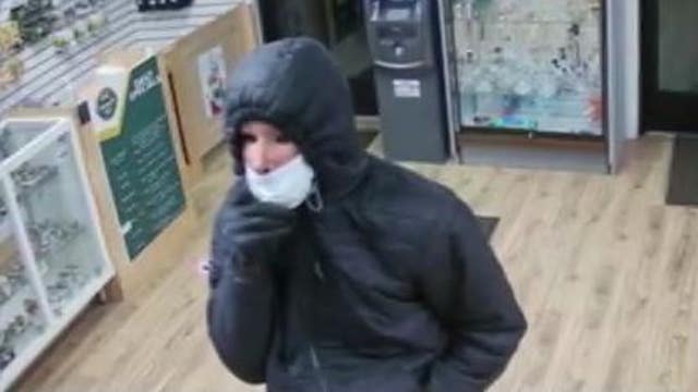 Help ID creepy crook seen wearing Halloween mask to rob pot shop clerk at gunpoint