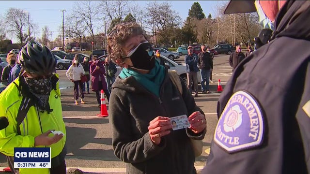 Vaccine hunters hope for extra doses at Seattle vaccine site