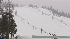 Spring snowfall has search and rescue crews monitoring avalanche risks at Snoqualmie Pass