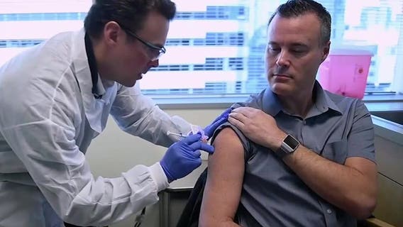 Bothell man receives third dose of Moderna vaccine as part of booster trial