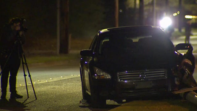 Tacoma police searching for suspect after woman found dead outside of crashed car