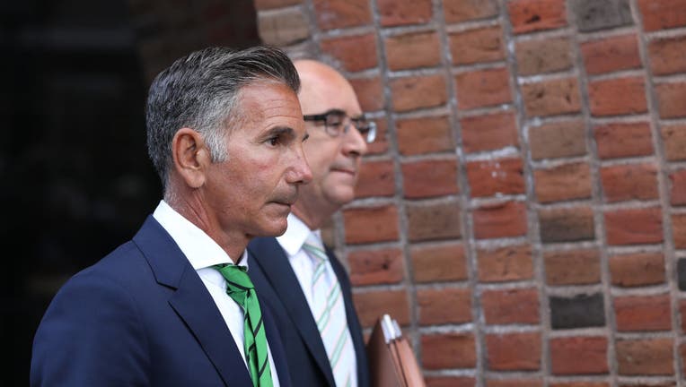 c2a6fc76-Felicity Huffman, Lori Loughlin Arrive At Boston Court For College Cheating Case