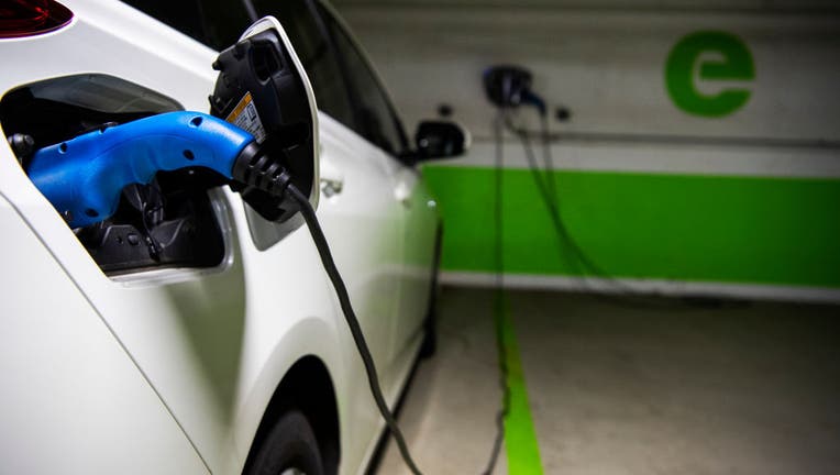 FILE IMAGE - A Toyota Prius is seen connected to a electric vehicle charging station in a Washington, D.C., parking garage on March 31, 2021. (Photo By Tom Williams/CQ-Roll Call, Inc via Getty Images)