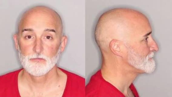 Mark Hicks: Wanted suspect charged with assaulting airport worker after being banned from getting on flight