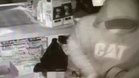 Video shows smash and grab burglar who stole lottery tickets and cigarettes