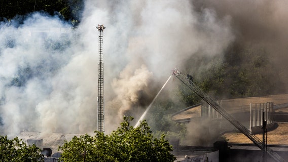 Two-alarm fire near Seattle's Space Needle sends smoke billowing into sky