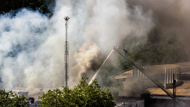 Two-alarm fire near Seattle's Space Needle sends smoke billowing into sky