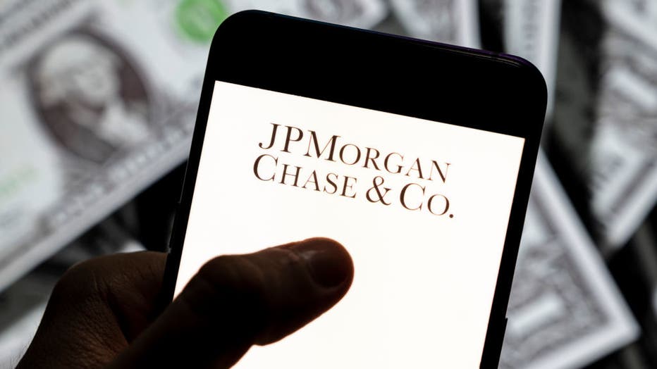 In this photo illustration, a JPMorgan Chase & Co (JP Morgan