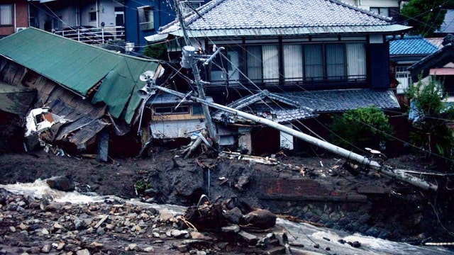 Japan mudslide: 4 dead, dozens missing as rescue crews search through debris