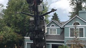 2 workers hurt when crane collapses onto house in Issaquah
