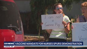 Demonstrators back nurses denouncing vaccination requirements at PeaceHealth St. Joseph Medical Center