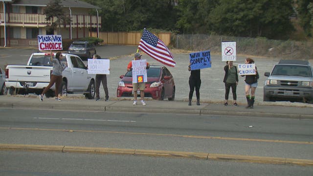 Demonstrating against vaccine mandates as Pfizer’s COVID shot gains FDA approval