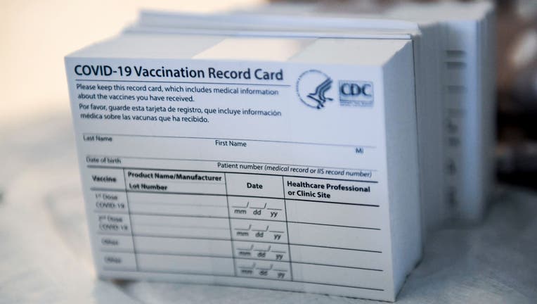 FILE - A stack of COVID-19 Vaccination Record Cards from the U.S. Centers for Disease Control and Prevention. (Photo by Ben Hasty/MediaNews Group/Reading Eagle via Getty Images)