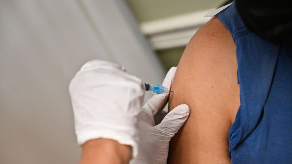 aabd5ee6-Moderna Covid-19 vaccine is injected into an arm