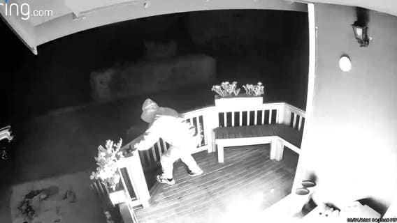 Video shows suspect dousing Enumclaw porch in flammable liquid before setting it on fire