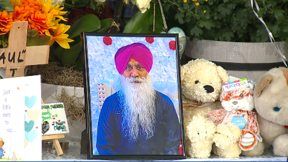 Nearly 200 people gather for vigil remembering gas station worker killed in Lynnwood