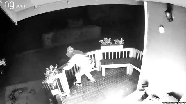 Video shows suspect dousing Enumclaw porch in flammable liquid before setting it on fire