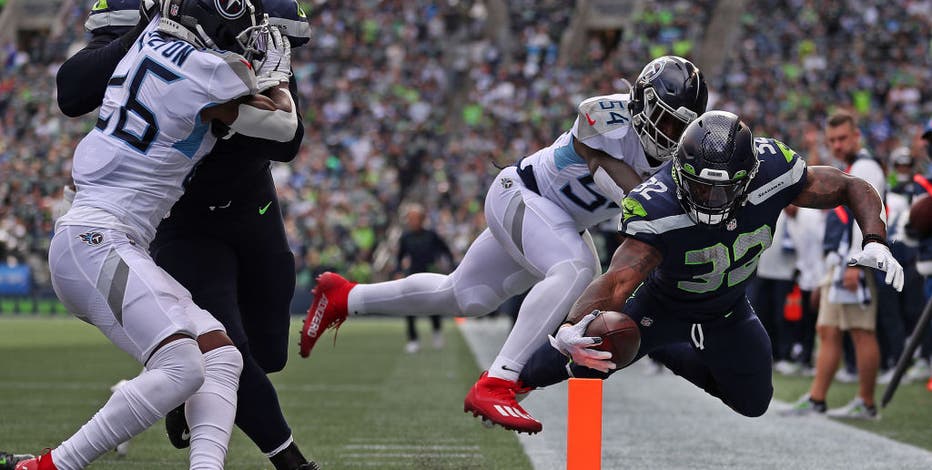 King Henry leads Titans' late rally to stun Seahawks 33-30