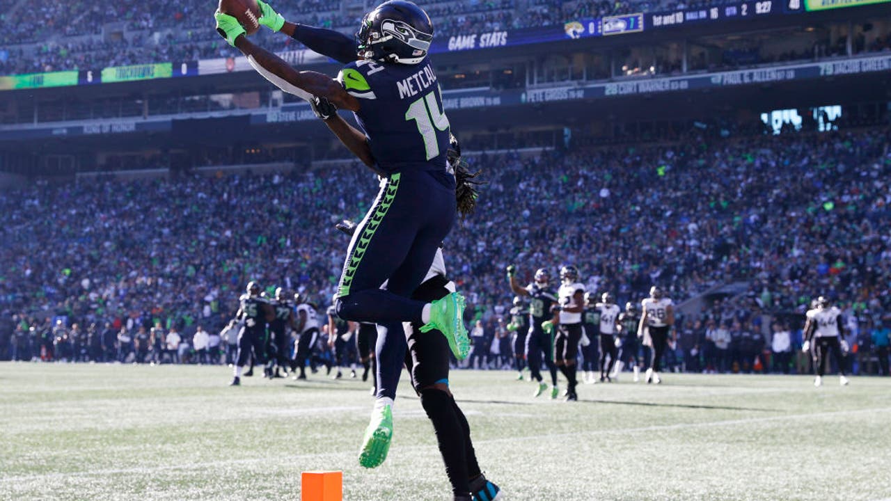 Seattle Seahawks' D.K. Metcalf catches a touchdown pass during the