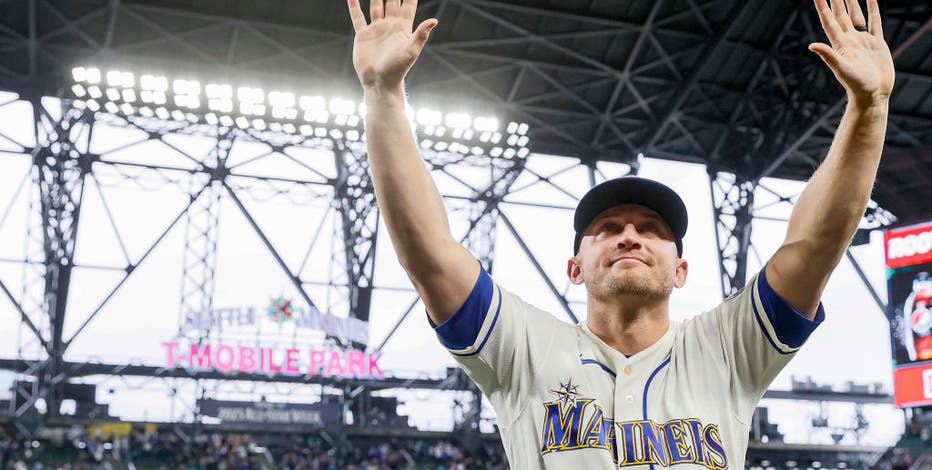 Photos of Seattle Mariners fans cheering are shown in the stands of  T-Mobile Park during the ninth inning of the Mariners' final home baseball  game of the regular season, a game against