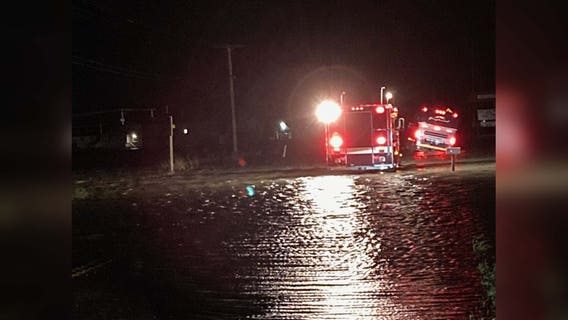 Heed the 'road closed' signs: Flooding sweeps full Greyhound bus into a ditch