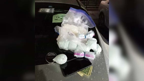 Officer stops theft suspect, recovers drugs and $7,000 in cash