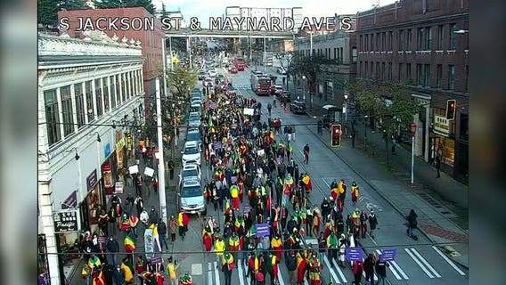 Protestors march through downtown Seattle
