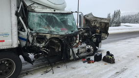 1 hurt after semi hits 3 semis chaining up on I-90