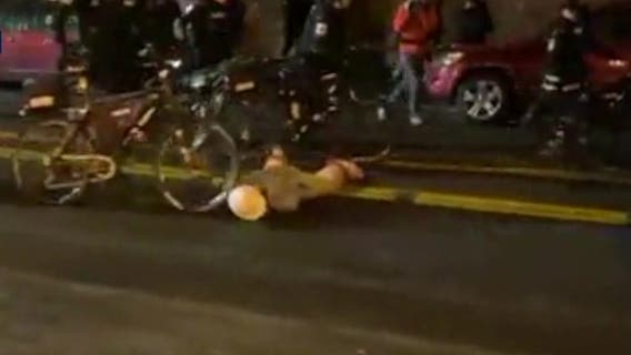 Seattle police officer who rolled bike over protester's head gets 7-day suspension