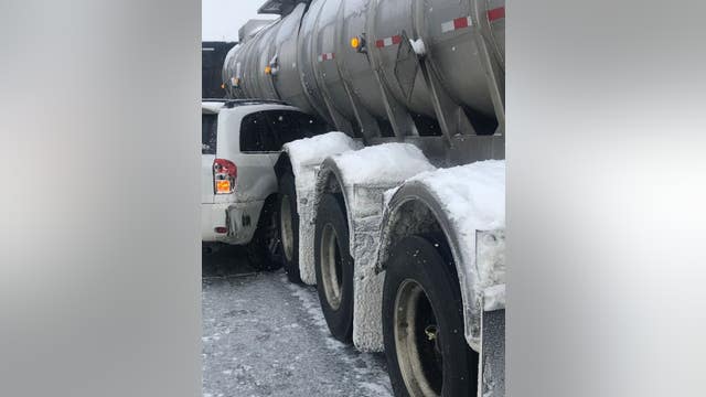 I-90 over Snoqualmie Pass reopens after SUV crashes into tanker carrying hazardous material