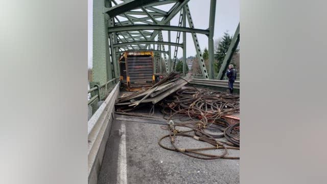 Truck spills cargo, damaging and closing Tukwila bridge