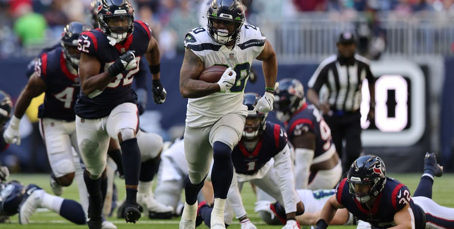 Seattle Seahawks defeat Texans 33-13, keeping slim playoff hopes