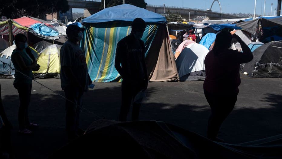 a9dd1d0e-MEXICO-US-MIGRATION-HEALTH-VIRUS-VACCINES